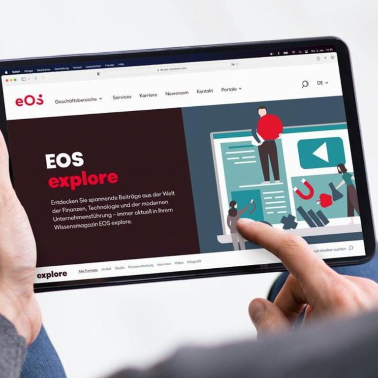 Man reading EOS news on tablet